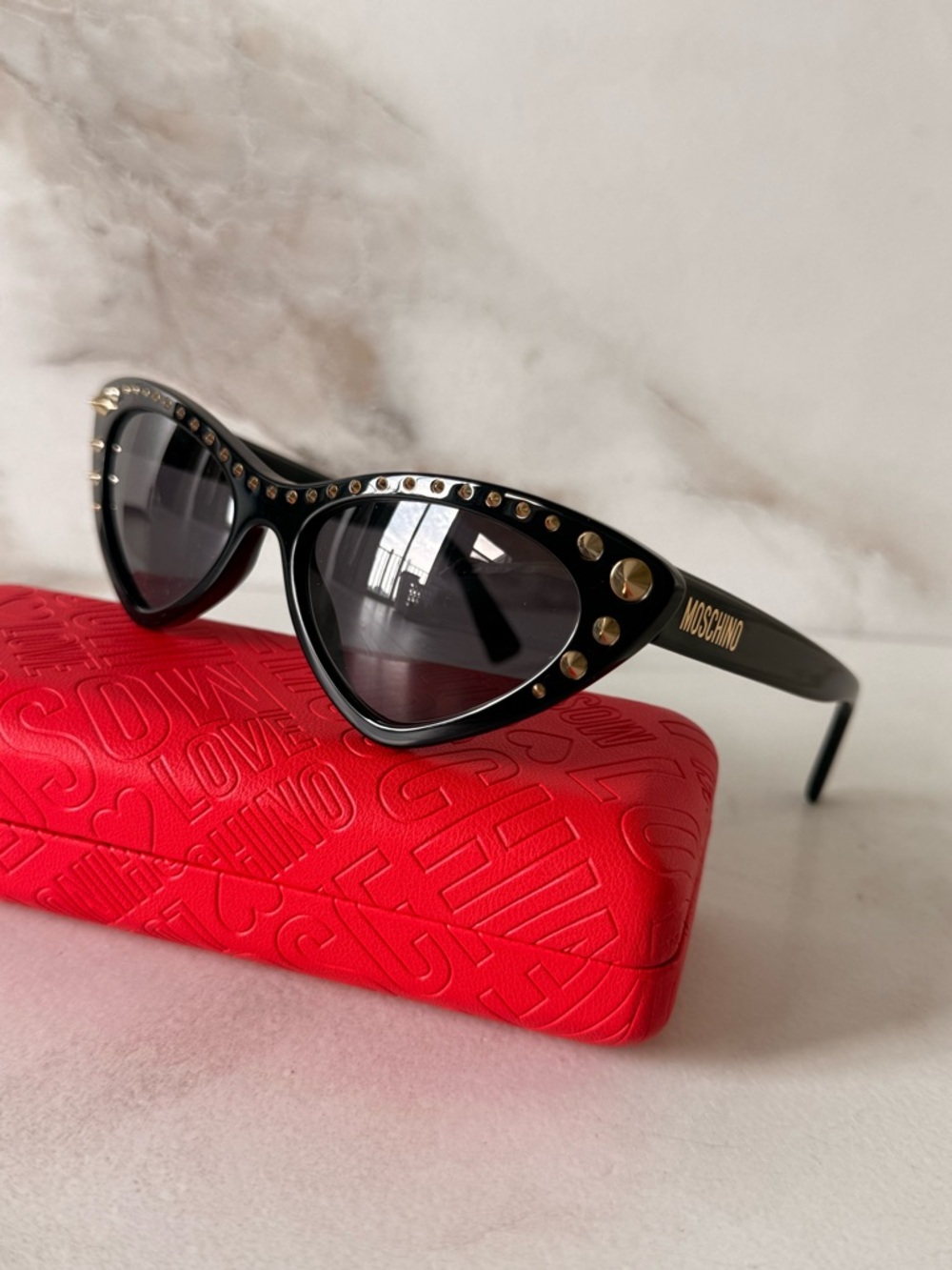 Moschino Black Cat-Eye Sunglasses with Gold Studs